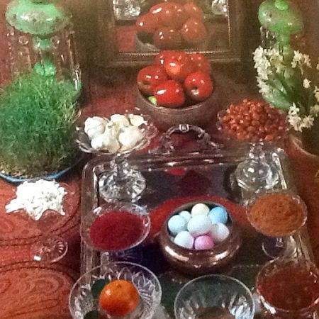 Norooz table set with holiday delicacies