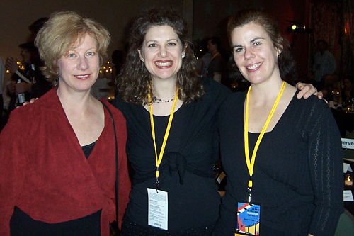 Three women with Sedona Film Festival badges