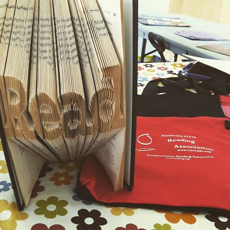 Book carved into Read sign - Nebraska State Literacy table