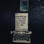 typewriter with saying